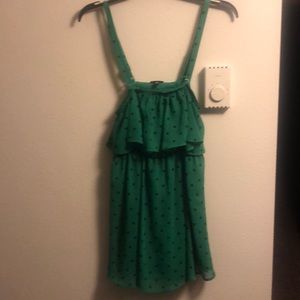 Fun green top with black polka dots